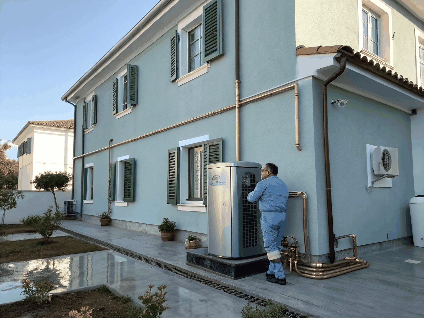 Clean exterior installation of a modern residential heat pump